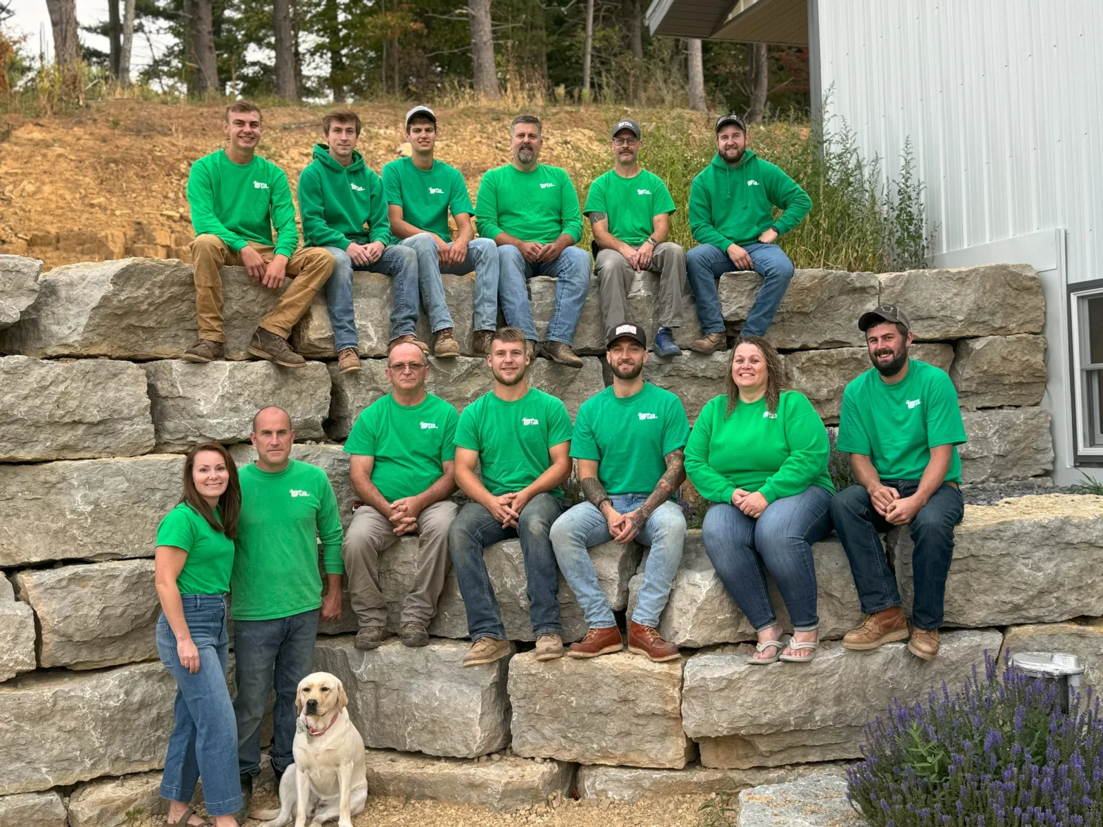 The Top Tier crew standing together outside the shop in Reedsburg.